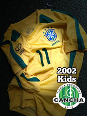 CAMISETA BRASIL RETRO LOCAL 2002 KIDS