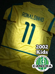 CAMISETA BRASIL RETRO LOCAL 2002 KIDS