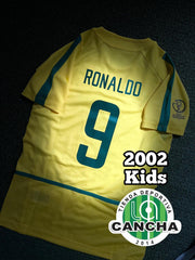 CAMISETA BRASIL RETRO LOCAL 2002 KIDS