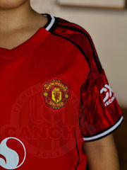 CONJUNTO MANCHESTER UNITED LOCAL 2025/2026 NIÑO